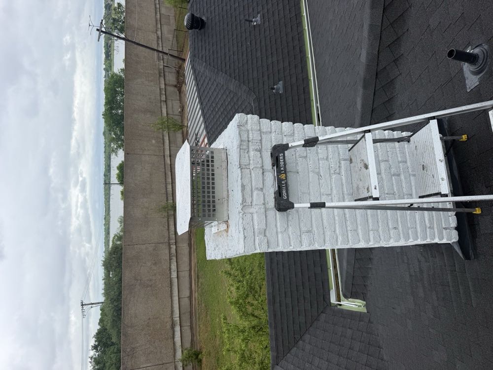 Stainless animal screen installed on a Dallas chimney to keep birds, squirrels and raccoons out