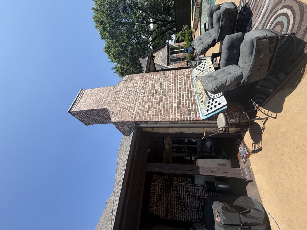 Tall custom-built chimney on a Dallas–Fort Worth home