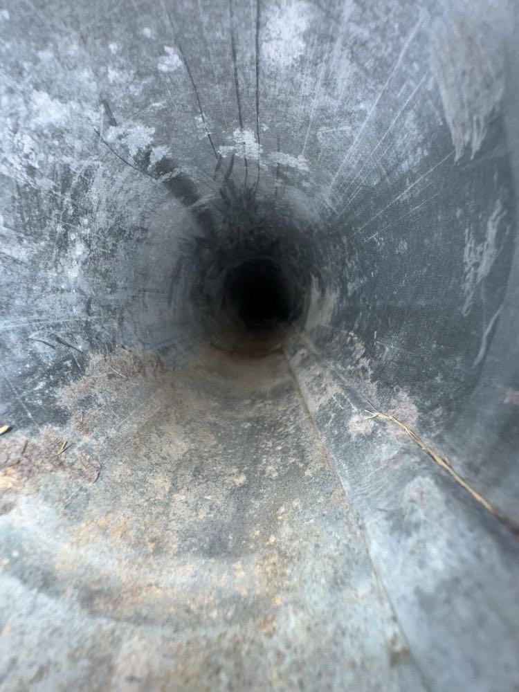 New stainless steel flue liner installed in a Dallas chimney — smooth, sealed and code-compliant