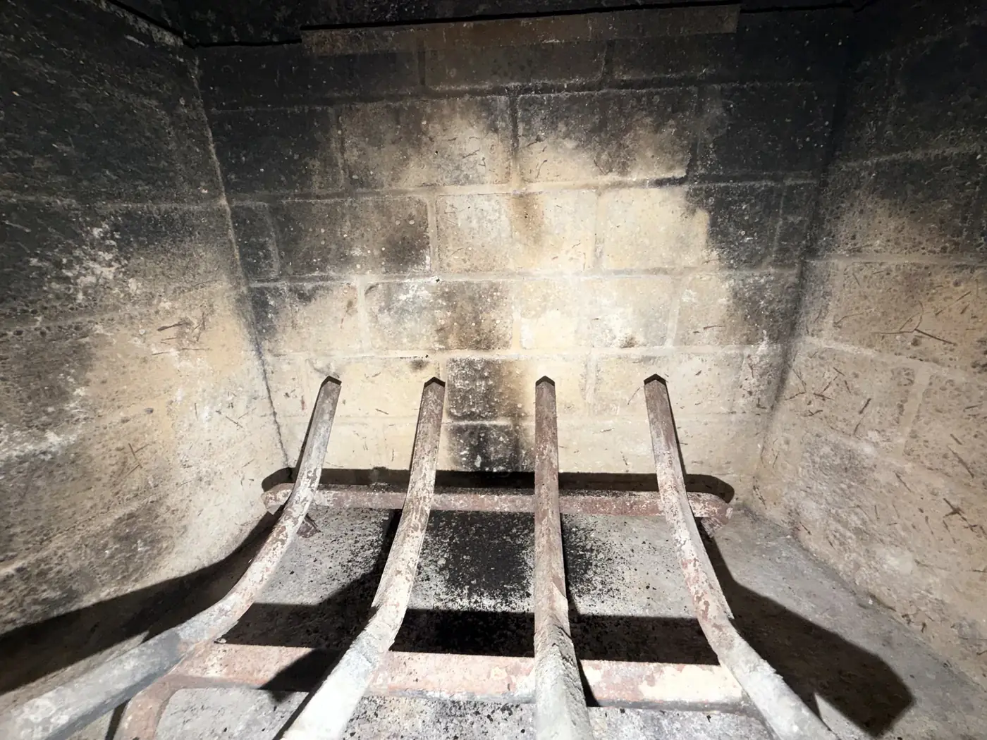 Firebox and grate after a full cleaning by Texan Flue