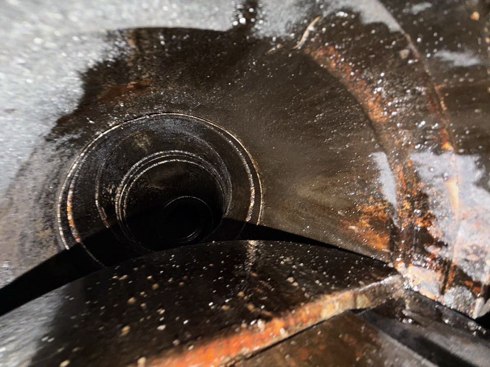 Close-up of heavy creosote inside a Dallas chimney flue before professional removal
