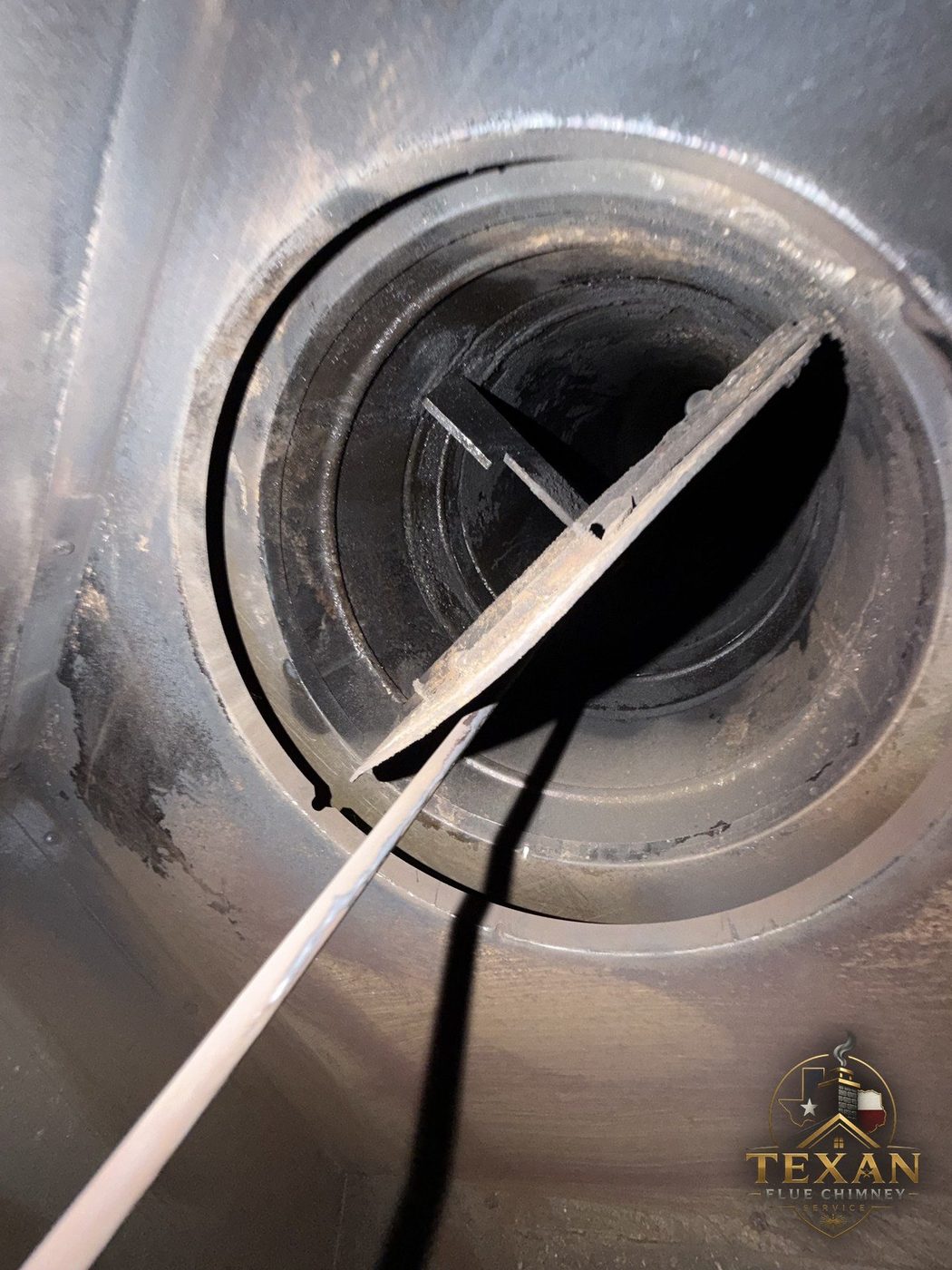 Inspecting the damper and flue from inside the firebox — Texan Flue, Dallas–Fort Worth