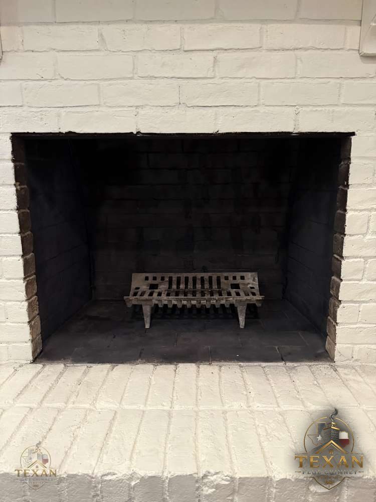 Restored masonry firebox — interior fireplace work by Texan Flue
