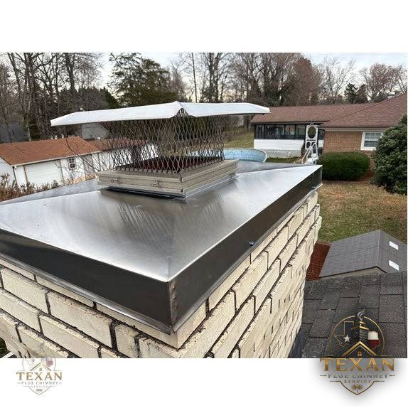 Stainless chase cover freshly installed on a framed chimney chase